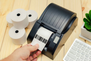 Office equipment, A point of sale receipt printer printing a receipt - Assistencia Tecnica Balanças e Automação Comercial